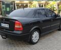 Черный Опель Астра, объемом двигателя 1.4 л и пробегом 166 тыс. км за 4700 $, фото 3 на Automoto.ua