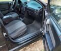 Черный Опель Астра, объемом двигателя 1.4 л и пробегом 320 тыс. км за 3750 $, фото 4 на Automoto.ua