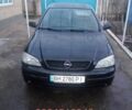 Черный Опель Астра, объемом двигателя 1.4 л и пробегом 258 тыс. км за 1000 $, фото 1 на Automoto.ua