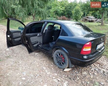 Черный Опель Астра, объемом двигателя 1.4 л и пробегом 320 тыс. км за 3750 $, фото 9 на Automoto.ua