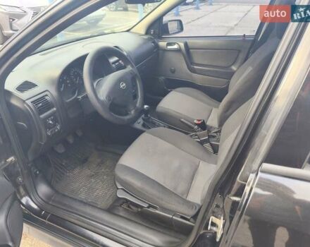 Черный Опель Астра, объемом двигателя 1.4 л и пробегом 217 тыс. км за 2900 $, фото 7 на Automoto.ua