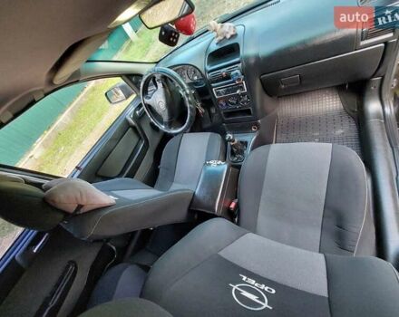 Черный Опель Астра, объемом двигателя 1.4 л и пробегом 320 тыс. км за 3750 $, фото 3 на Automoto.ua