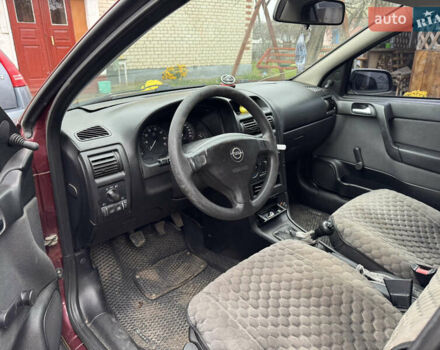 Черный Опель Астра, объемом двигателя 1.4 л и пробегом 208 тыс. км за 4500 $, фото 10 на Automoto.ua