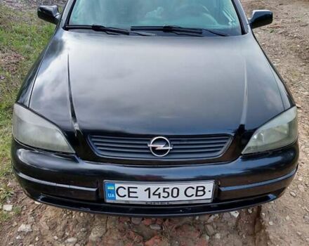 Черный Опель Астра, объемом двигателя 1.4 л и пробегом 320 тыс. км за 3750 $, фото 2 на Automoto.ua