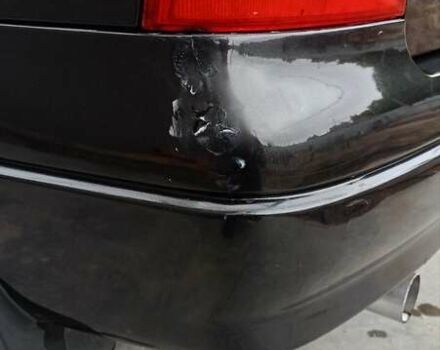 Черный Опель Астра, объемом двигателя 1.36 л и пробегом 291 тыс. км за 4000 $, фото 4 на Automoto.ua