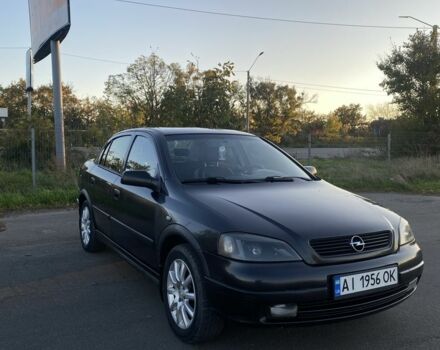 Черный Опель Астра, объемом двигателя 1.4 л и пробегом 300 тыс. км за 2800 $, фото 1 на Automoto.ua