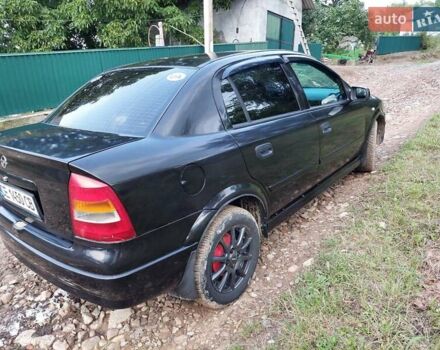 Черный Опель Астра, объемом двигателя 1.4 л и пробегом 320 тыс. км за 3750 $, фото 8 на Automoto.ua