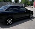 Черный Опель Астра, объемом двигателя 1.39 л и пробегом 215 тыс. км за 3500 $, фото 6 на Automoto.ua