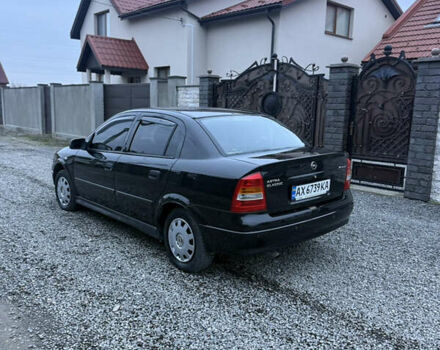 Черный Опель Астра, объемом двигателя 1.36 л и пробегом 260 тыс. км за 2900 $, фото 2 на Automoto.ua