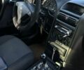 Черный Опель Астра, объемом двигателя 1.4 л и пробегом 185 тыс. км за 3000 $, фото 14 на Automoto.ua