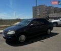 Черный Опель Астра, объемом двигателя 1.36 л и пробегом 220 тыс. км за 3600 $, фото 1 на Automoto.ua