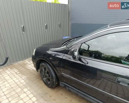 Черный Опель Астра, объемом двигателя 1.6 л и пробегом 147 тыс. км за 2700 $, фото 9 на Automoto.ua