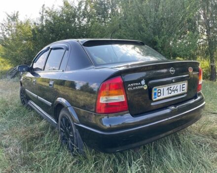Черный Опель Астра, объемом двигателя 1.4 л и пробегом 294 тыс. км за 3800 $, фото 4 на Automoto.ua