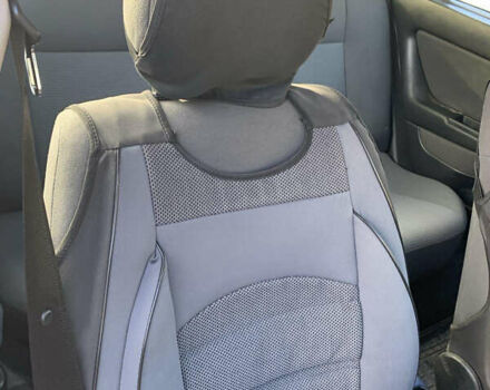 Черный Опель Астра, объемом двигателя 1.4 л и пробегом 216 тыс. км за 3500 $, фото 7 на Automoto.ua