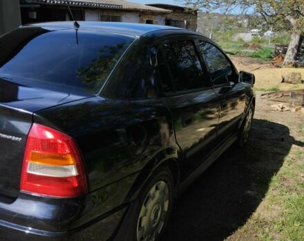 Черный Опель Астра, объемом двигателя 1.4 л и пробегом 304 тыс. км за 3250 $, фото 3 на Automoto.ua