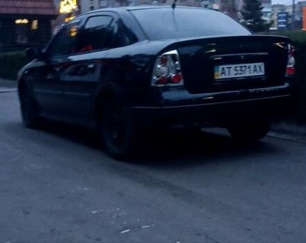 Черный Опель Астра, объемом двигателя 1.39 л и пробегом 214 тыс. км за 1800 $, фото 8 на Automoto.ua