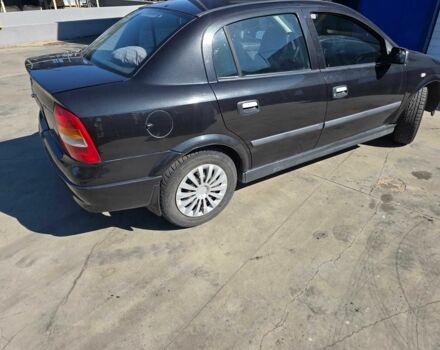 Черный Опель Астра, объемом двигателя 1.4 л и пробегом 240 тыс. км за 3000 $, фото 3 на Automoto.ua