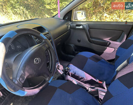 Черный Опель Астра, объемом двигателя 1.4 л и пробегом 230 тыс. км за 2100 $, фото 6 на Automoto.ua