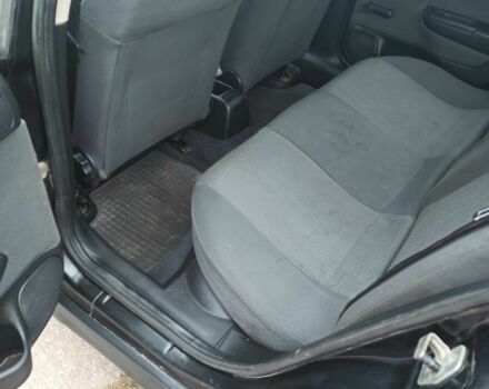 Черный Опель Астра, объемом двигателя 1.4 л и пробегом 282 тыс. км за 2000 $, фото 8 на Automoto.ua