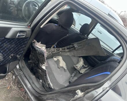 Черный Опель Астра, объемом двигателя 1.4 л и пробегом 150 тыс. км за 900 $, фото 2 на Automoto.ua