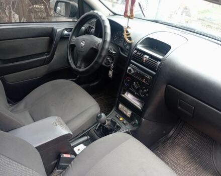 Черный Опель Астра, объемом двигателя 1.4 л и пробегом 280 тыс. км за 3700 $, фото 2 на Automoto.ua