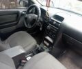 Черный Опель Астра, объемом двигателя 1.4 л и пробегом 280 тыс. км за 3700 $, фото 2 на Automoto.ua