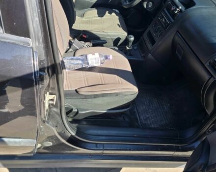 Черный Опель Астра, объемом двигателя 1.4 л и пробегом 240 тыс. км за 3000 $, фото 4 на Automoto.ua