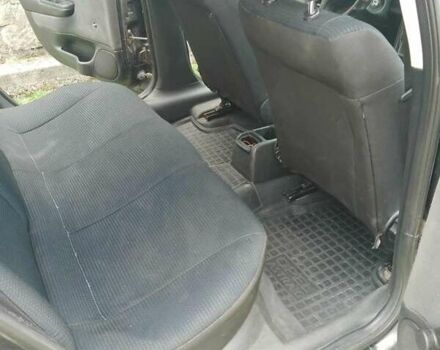 Черный Опель Астра, объемом двигателя 1.4 л и пробегом 243 тыс. км за 3200 $, фото 1 на Automoto.ua