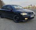 Чорний Опель Астра, об'ємом двигуна 1.4 л та пробігом 251 тис. км за 2950 $, фото 1 на Automoto.ua