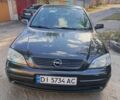Черный Опель Астра, объемом двигателя 1.4 л и пробегом 136 тыс. км за 3900 $, фото 1 на Automoto.ua