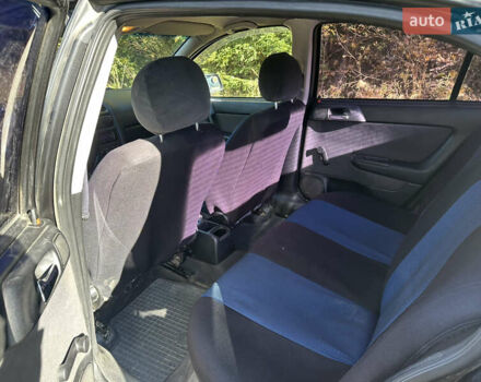 Черный Опель Астра, объемом двигателя 1.4 л и пробегом 230 тыс. км за 2100 $, фото 7 на Automoto.ua