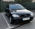 Черный Опель Астра, объемом двигателя 1.4 л и пробегом 250 тыс. км за 4200 $, фото 1 на Automoto.ua