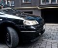Черный Опель Астра, объемом двигателя 1.4 л и пробегом 214 тыс. км за 1800 $, фото 15 на Automoto.ua