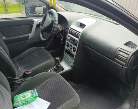 Черный Опель Астра, объемом двигателя 1.6 л и пробегом 147 тыс. км за 2700 $, фото 18 на Automoto.ua