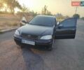Черный Опель Астра, объемом двигателя 1.4 л и пробегом 221 тыс. км за 3500 $, фото 1 на Automoto.ua