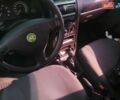 Черный Опель Астра, объемом двигателя 1.4 л и пробегом 250 тыс. км за 3000 $, фото 5 на Automoto.ua