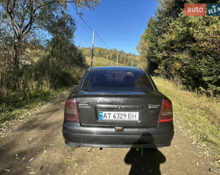 Черный Опель Астра, объемом двигателя 1.4 л и пробегом 230 тыс. км за 2100 $, фото 3 на Automoto.ua