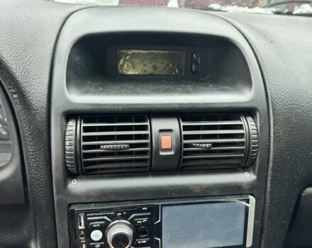 Черный Опель Астра, объемом двигателя 1.4 л и пробегом 208 тыс. км за 2849 $, фото 8 на Automoto.ua