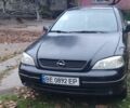 Черный Опель Астра, объемом двигателя 1.4 л и пробегом 315 тыс. км за 3000 $, фото 1 на Automoto.ua