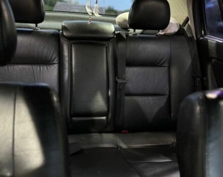 Черный Опель Астра, объемом двигателя 1.4 л и пробегом 215 тыс. км за 3500 $, фото 7 на Automoto.ua