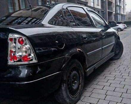 Черный Опель Астра, объемом двигателя 1.39 л и пробегом 214 тыс. км за 1800 $, фото 13 на Automoto.ua