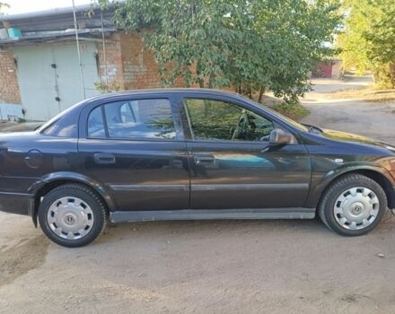 Черный Опель Астра, объемом двигателя 1.4 л и пробегом 136 тыс. км за 3900 $, фото 3 на Automoto.ua