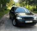 Чорний Опель Астра, об'ємом двигуна 1.4 л та пробігом 220 тис. км за 2300 $, фото 1 на Automoto.ua