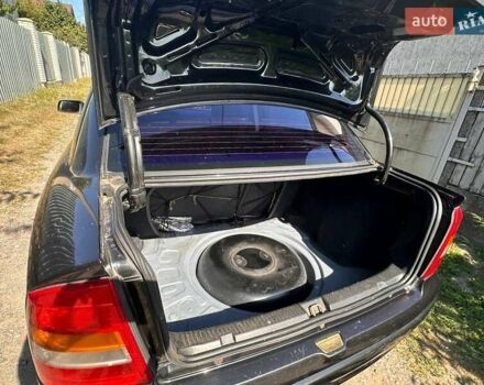 Черный Опель Астра, объемом двигателя 1.4 л и пробегом 310 тыс. км за 3100 $, фото 2 на Automoto.ua