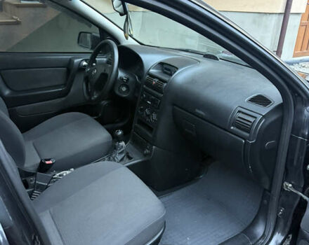 Черный Опель Астра, объемом двигателя 1.36 л и пробегом 260 тыс. км за 2900 $, фото 11 на Automoto.ua