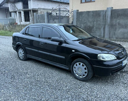 Черный Опель Астра, объемом двигателя 1.36 л и пробегом 260 тыс. км за 2900 $, фото 3 на Automoto.ua