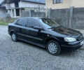 Черный Опель Астра, объемом двигателя 1.36 л и пробегом 260 тыс. км за 2900 $, фото 3 на Automoto.ua