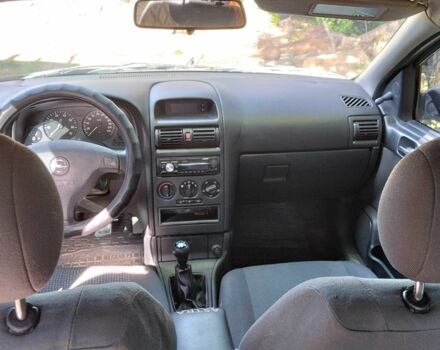 Черный Опель Астра, объемом двигателя 1.4 л и пробегом 304 тыс. км за 3250 $, фото 7 на Automoto.ua