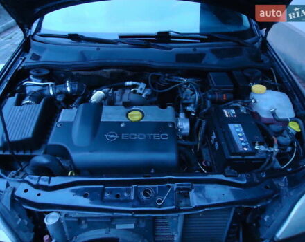 Черный Опель Астра, объемом двигателя 2 л и пробегом 300 тыс. км за 3500 $, фото 5 на Automoto.ua