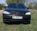 Чорний Опель Астра, об'ємом двигуна 1.4 л та пробігом 320 тис. км за 2700 $, фото 1 на Automoto.ua